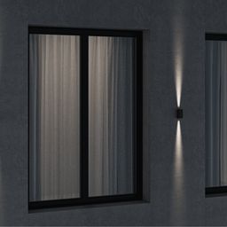 Divara quraşdırılan fasad işıqlandırıcısı, divarda iki istiqamətli işıq şüaları
